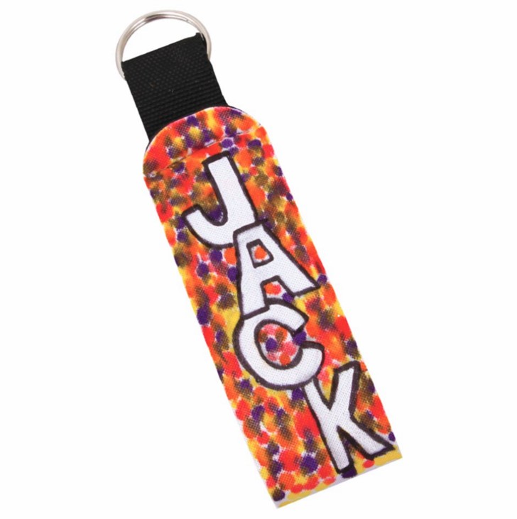 a colourful keyring with the word Jack written on it in white texta